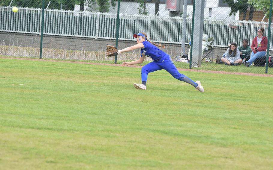 Ramstein center fielder Natalie Briceland tries to make a catch on a ball hit by Wiesbaden's Lyndsey Urick that turned out to be a run-scoring triple in the DODEA-Europe Division I softball championship game Saturday, May 20, 2023, at Kaiserslautern, Germany.