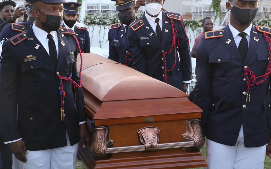 Soldiers of the Armed Forces of Haiti carry the casket of slain President Jovenel Moïse before his funeral on July 23, 2021, in Cap-Haitien, Haiti. Moïse, 53, was shot dead in his home in the early hours of July 7. 