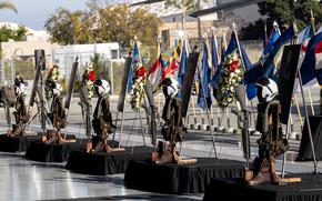 Five battlefield crosses are displayed in honor of five Marines of Marine Heavy Helicopter Squadron (HMH) 361, Marine Aircraft Group 16, 3rd Marine Aircraft Wing, during a memorial ceremony at Marine Corps Air Station Miramar, California, Feb. 16, 2024. More than 550 Marines, family and friends gathered to pay tribute to the five Marines who lost their lives as the result of a CH-53E mishap on Feb. 6, 2024, in Pine Valley, California. (U.S. Marine Corps photo by Staff Sgt. Antonio De La Fuente)