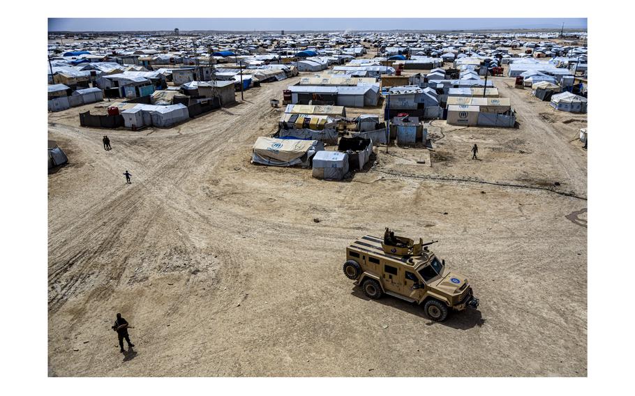 Kurdish forces patrol al-Hol camp, which houses families of members of the Islamic State group in Hasakeh province, Syria, on April 19, 2023. 