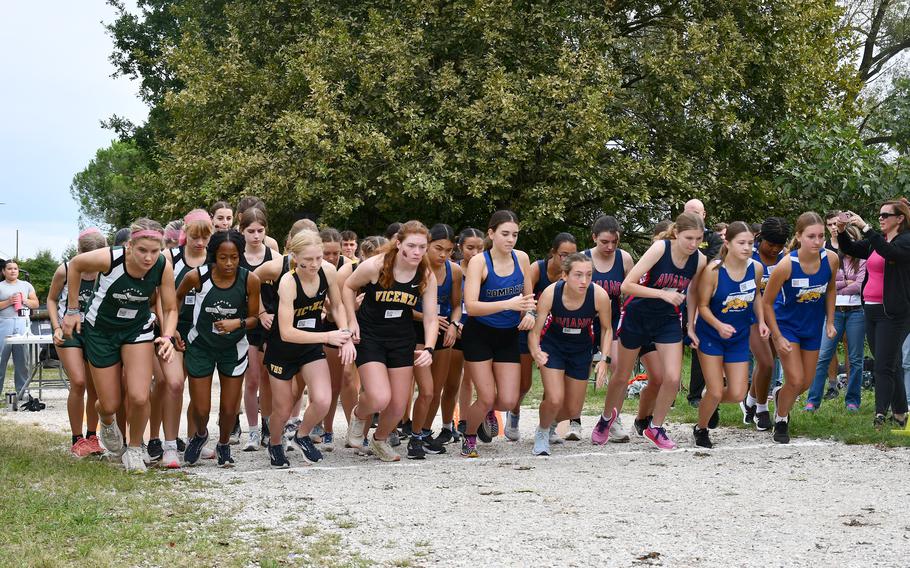 Girls cross country runners prepare to race at Lago di Fimon outside Vicenza, Italy, on Saturday, Sept. 14, 2024.