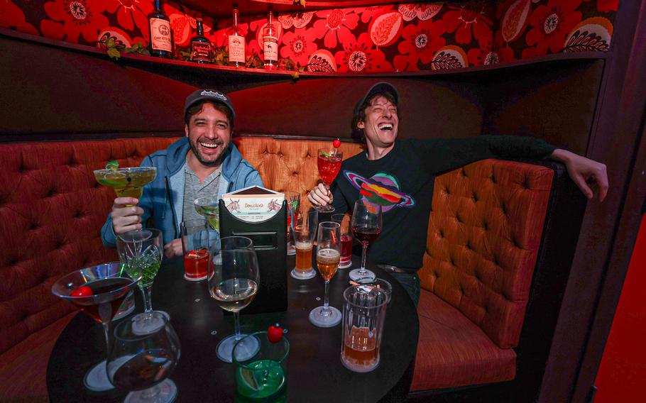Ladder designers Tommy Wallach and Terry Pettigrew-Rolapp at Douchie’s Bar, a ‘70s-themed room of the escape room, on April 2 in Los Angeles.