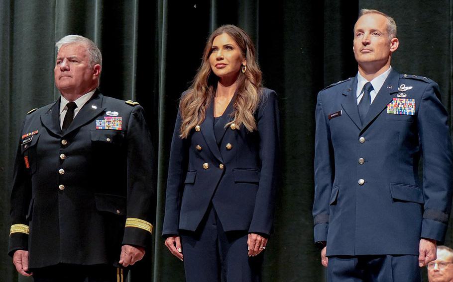 Attending a change of command ceremony are from left Maj. Gen. Jeffrey Marlette, South Dakota Gov. Kristi Noem and Maj. Gen. Mark Morrell.