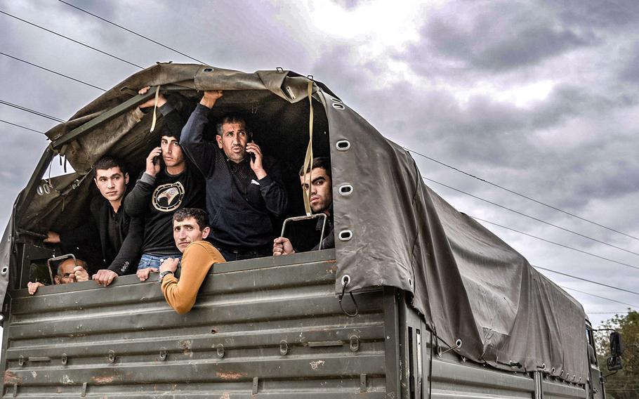 Armenians from Nagorno-Karabakh are evacuated on Sept. 26, 2023, in Kornidzor, Armenia. Some 30,000 Armenians have fled Nagorno-Karabakh in the past week after the defeat of Armenian separatist forces against Azerbaijan. 