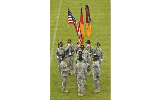 The 2nd Cavalry Regiment displays national flags and the regimental guidon during a change of responsibility ceremony in 2014 at Rose Barracks in Vilseck, Germany. The U.S. and German flags were stolen from the regiment’s headquarters overnight between Oct. 3 and Oct. 4, 2021, Army officials said. A Confederate battle flag was found on a flagpole outside and removed upon discovery, officials said.   
