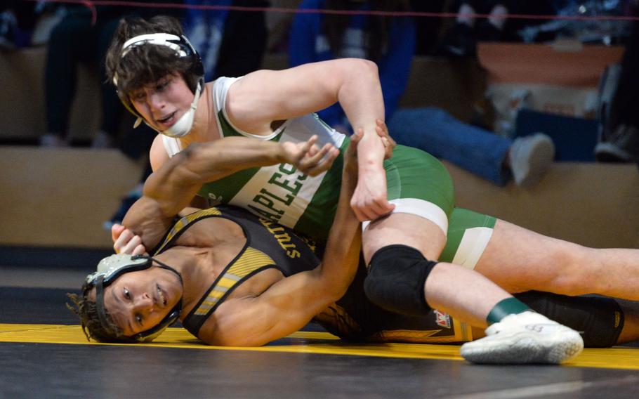 Sam Pounds of Naples beat Stuttgart’s Josiah Doughty in the 150-pound final at the DODEA-Europe wrestling championships, in Wiesbaden, Germany, Feb. 11, 2023. 