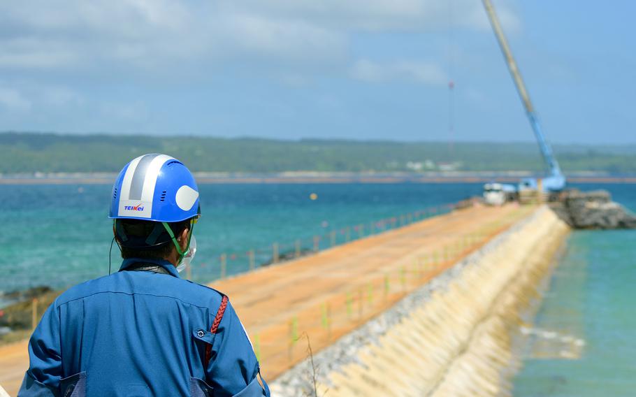 Construction work continues on a Marine Corps runway into Oura Bay at Camp Schwab, Okinawa, Sept. 15, 2022. Work to reclaim a portion of seabed for a new Marine Corps airfield on Okinawa began Wednesday after a Japanese Cabinet minister approved job changes over local objections.