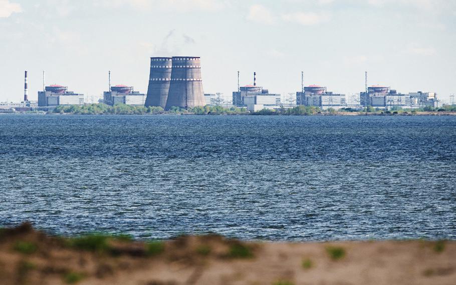 A view shows the Zaporizhzhia nuclear power plant, situated in the Russian-controlled area of Enerhodar, seen from Nikopol in April 27, 2022.