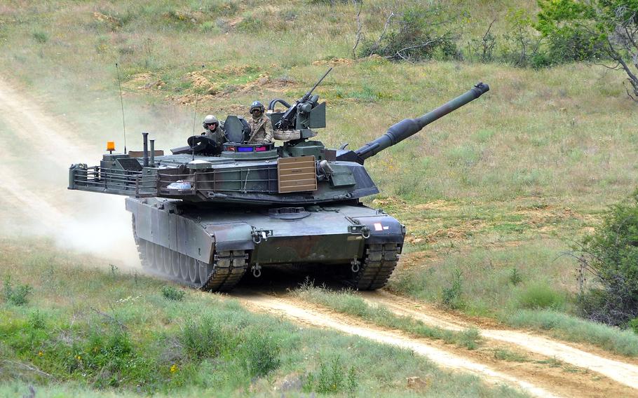 A U.S. Army M1A2 Abrams tank rumbles across Novo Selo Training Area, Bulgaria, in 2015. Poland announced July 14, 2021, that it will purchase 250 of the tanks from the U.S., at a cost of $6 billion. 