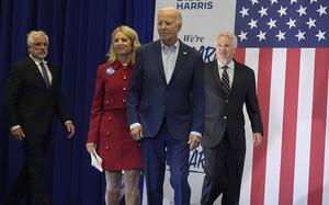 Joe Biden and members of the Kennedy family including, from left, Maxwell Kennedy Sr., Kerry Kennedy and Christopher Kennedy walk on stage at a campaign event in Philadelphia on April 18, 2024.