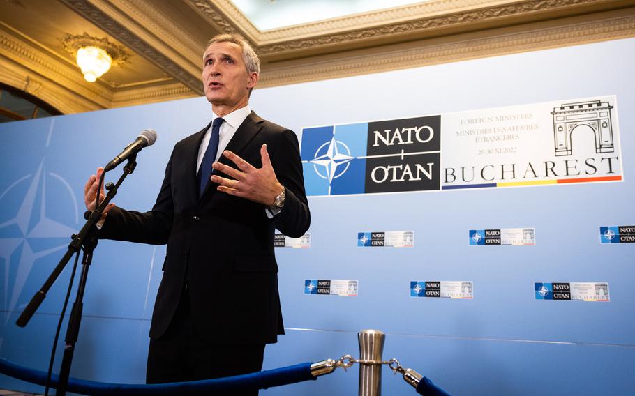 NATO Secretary-General Jens Stoltenberg talks to reporters before the meeting of member state foreign ministers in Bucharest, Romania, Nov. 29, 2022.