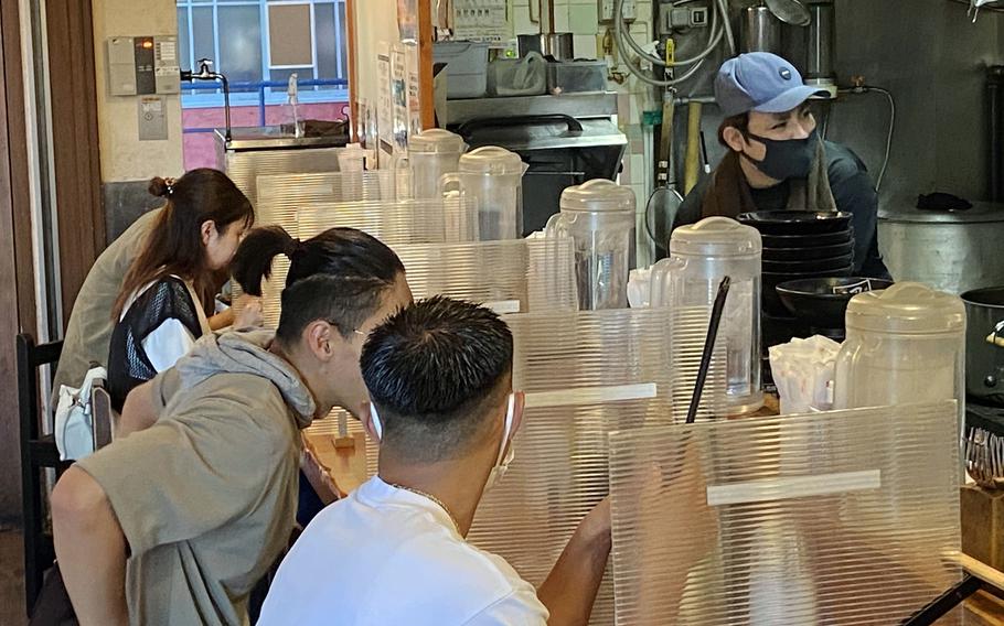 Hayate Maru is a Hokkaido-style ramen restaurant in Okinawa's American Village. There are just three employees: two cooks and one waiter. 