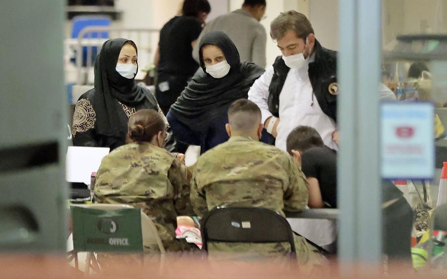 Afghan evacuees began arriving at Philadelphia International Airport in August. After processing at Terminal A East, most boarded buses to be taken to temporary housing at Joint Base McGuire-Dix-Lakehurst. This photo was taken shortly after 5 a.m. on Aug. 30, 2021. 