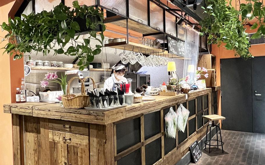 The Aoyama Flower Market Tea House in Tokyo is covered inside and out, and wall-to-wall, with fresh and artificial flowers.