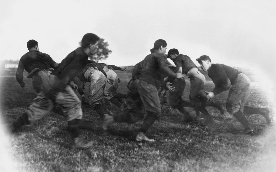 Jim Thorpe, right, started competing in track and playing football for the Carlisle Indian Industrial School in 1907. 