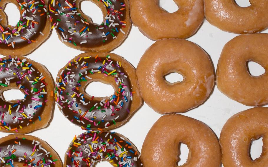 McDonald’s Corp. will bring Krispy Kreme Inc.’s doughnuts to its restaurants across the US, marking the burger chain’s latest effort to attract diners for breakfast and all-day snacking.