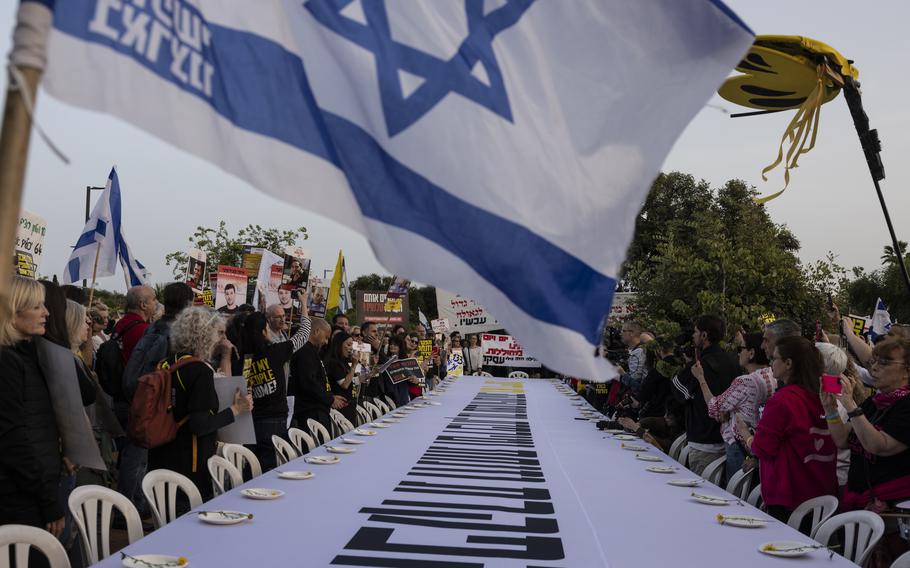 Families of Israeli hostages protest in front of Israeli Prime Minister Benjamin Netanyahu’s home on the eve of Passover in Caesarea, Israel, on Tuesday, April 23, 2024.