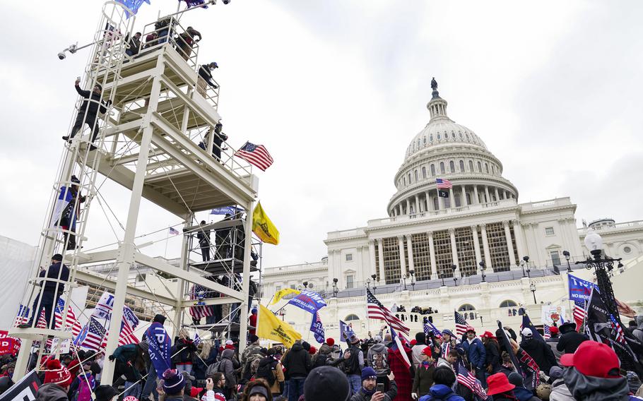 Rioters breach the U.S. Capitol in Washington on Jan. 6, 2021. 