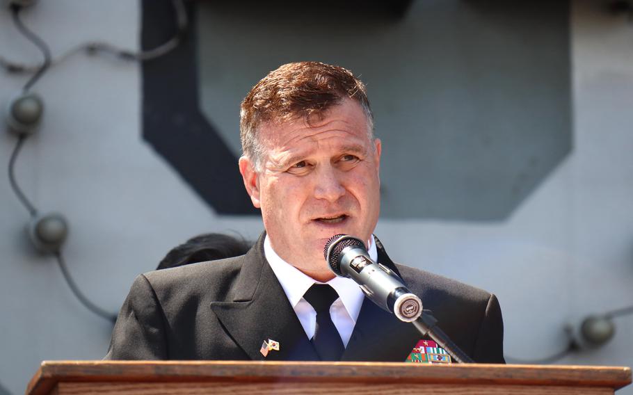 Rear Adm. Christopher Sweeney, commander of Carrier Strike Group 11, delivers remarks at a news conference aboard the USS Nimitz in Busan, South Korea, March 28, 2023. 