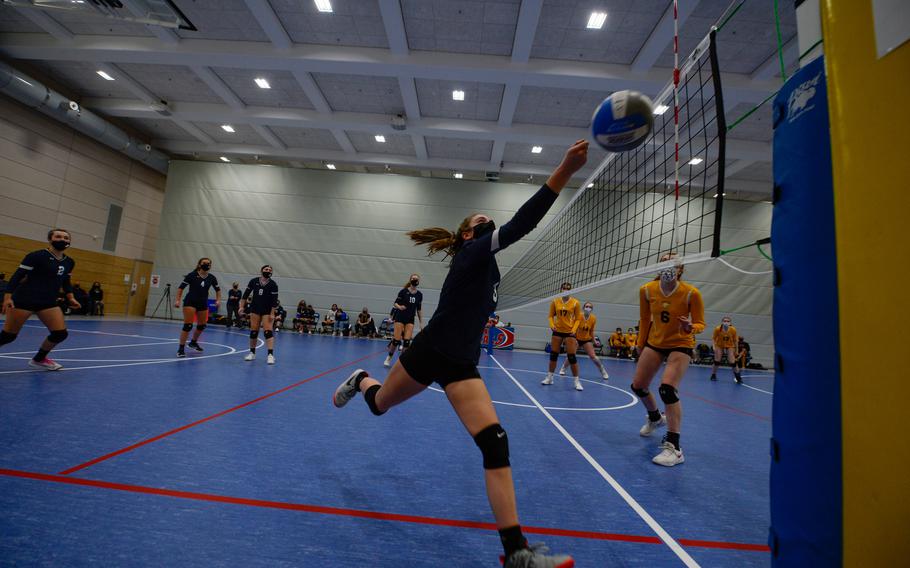 Katie Stemple of the Black Forest Academy Falcons reaches for the ball during her team’s first game of the DODEA-Europe Division I Volleyball Tournament, against the Stuttgart Panthers, at Ramstein Air Base, Germany, Oct. 29, 2021.