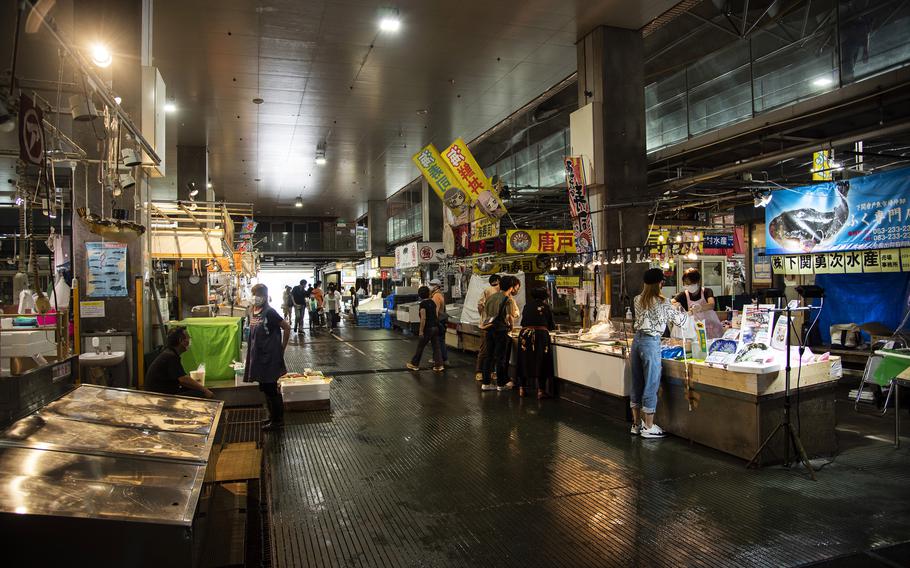 Finding a Karato Market stand that sells fugu is not difficult; many will have a decorative sign of the blowfish displayed with trays of sliced fugu sushi ready to be served.