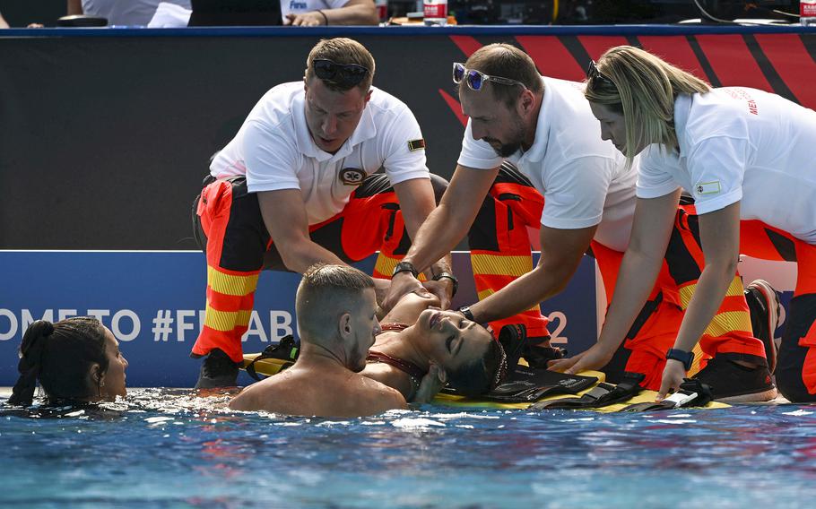 Anita Alvarez of United States is taken from the pool after collapsing during the solo free final of the artistic swimming at the 19th FINA World Championships in Budapest, Hungary, on Wednesday, June 22, 2022.