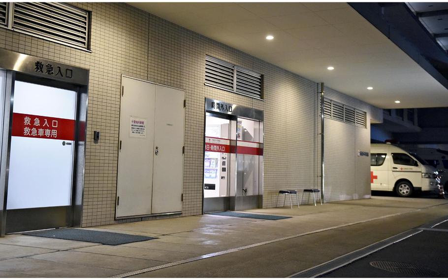 An emergency entrance, left, and an outpatient entrance are seen at Japanese Red Cross Omori Hospital in Ota Ward, Tokyo, on Wednesday, Feb. 2, 2022.