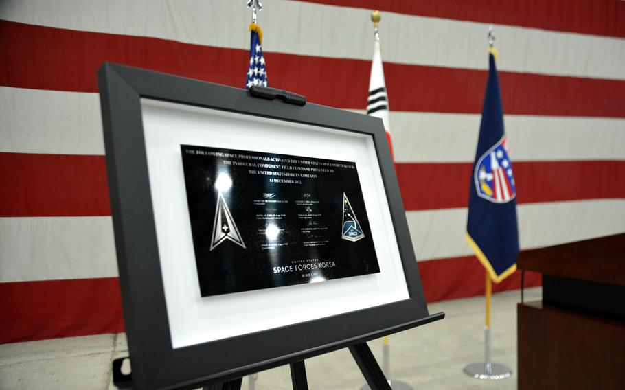A plaque commemorating the activation of U.S. Space Forces Korea is displayed at a ceremony at Osan Air Base, South Korea, Wednesday, Dec. 14, 2022. 
