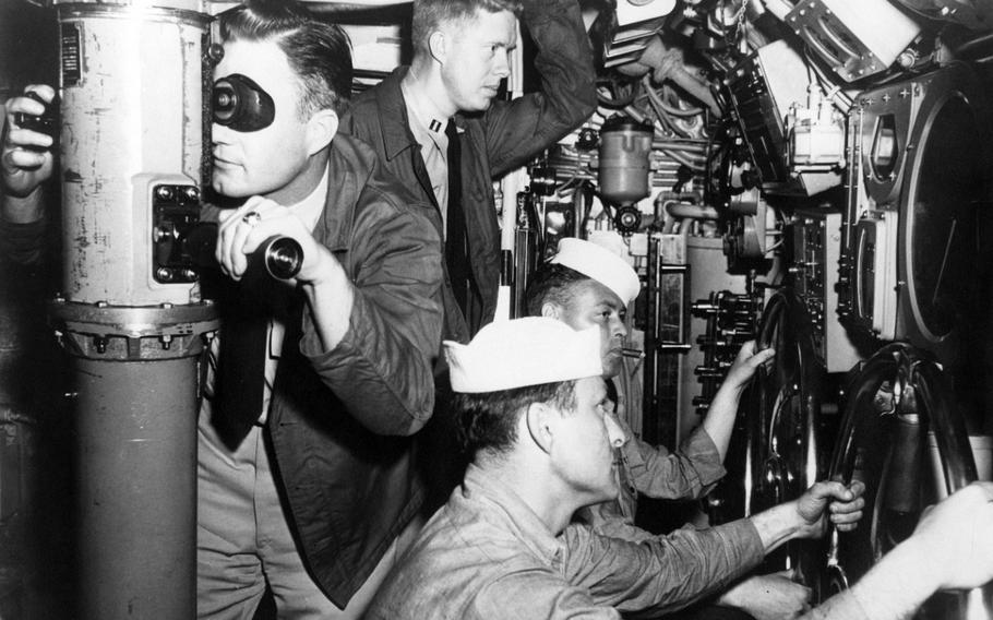 Lt. Jimmy Carter, center top, in the main control room of submarine USS K-1 in 1952. 