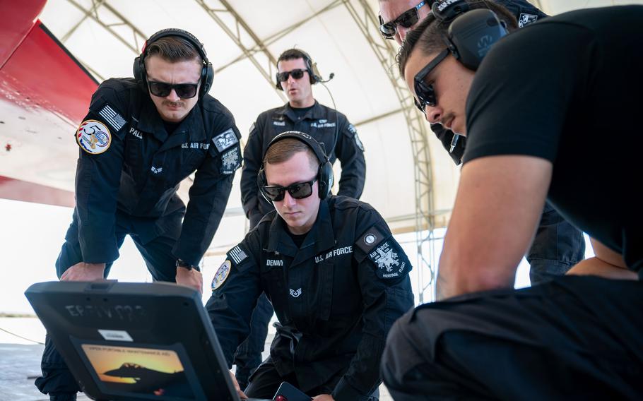 From left, U.S. Air Force Senior Airman Carter Pals, F-16 Viper Demonstration Team (VDT) dedicated crew chief; Senior Airman Grayson Reams, F-16 VDT electrical and environmental specialist; Staff Sgt. Austin Denny, F-16 VDT avionics specialist; Tech. Sgt. Joshua Butcher, F-16 VDT non-commissioned officer in charge; and Senior Airman Elias Sanchez, F-16 VDT dedicated crew chief, perform maintenance troubleshooting at Edwards Air Force Base, Calif., May 13, 2024. 