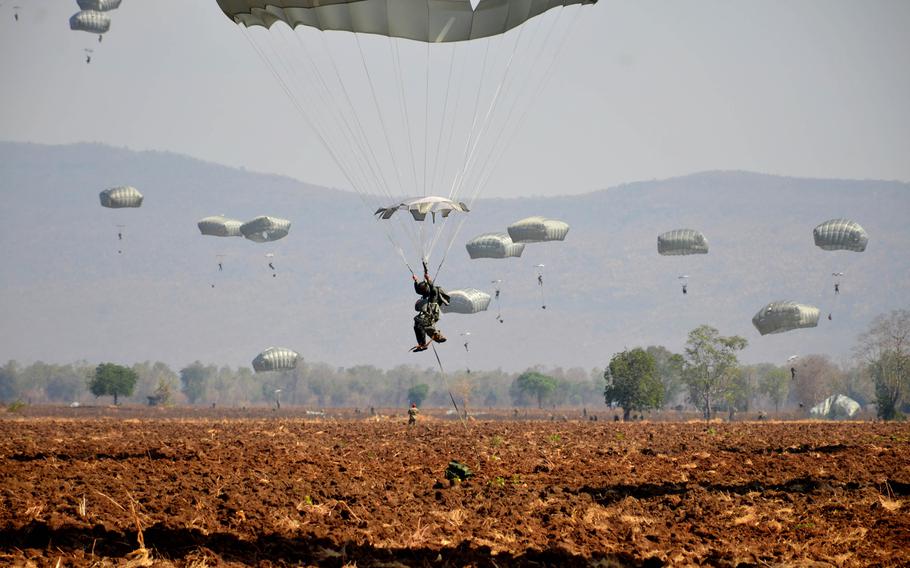 A Thai paratrooper prepares to land in central Thailand, March 5, 2024, during the Cobra Gold exercise.
