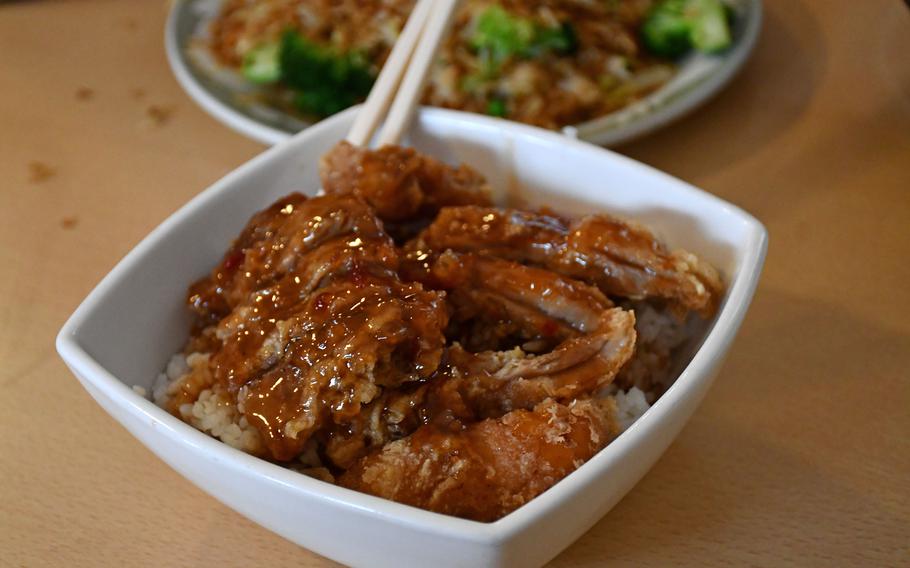 The roast duck with plum sauce donburi is one of over 160 items on the menu at Sakura Japanese and Chinese Restaurant in Lakenheath, England.