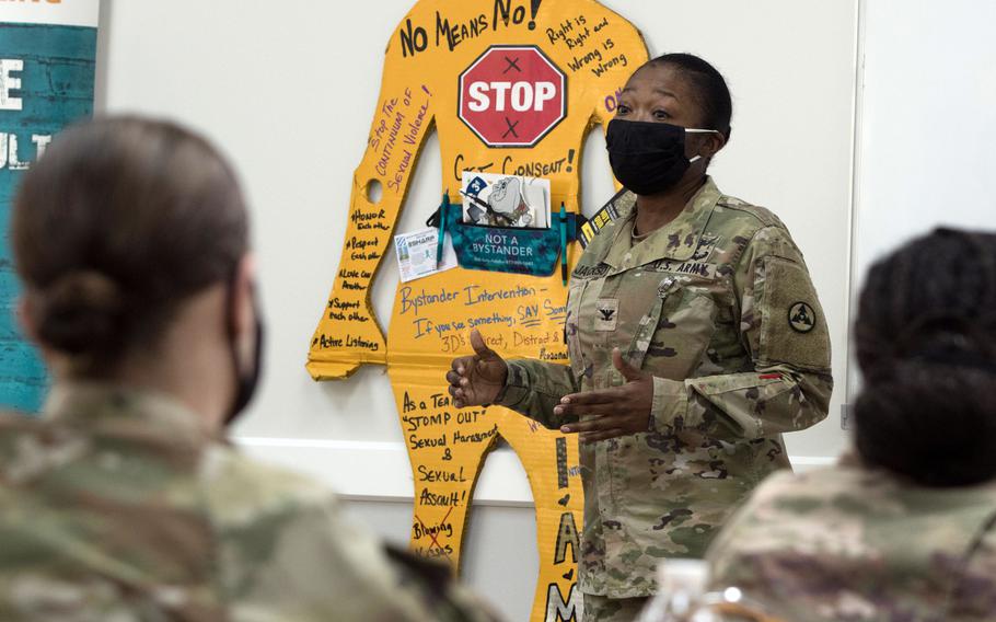 Col. Fenicia L. Jackson, chief of staff for the 1st Theater Sustainment Command Operational Command Post, talks to soldiers about sexual assault prevention at Camp Arifjan, Kuwait, Jan. 19, 2022. 