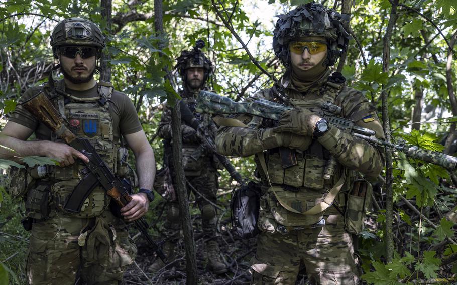 Ukrainian soldiers with the 47th Separate Mechanized Brigade at an undisclosed location in Ukraine in May 2023. 
