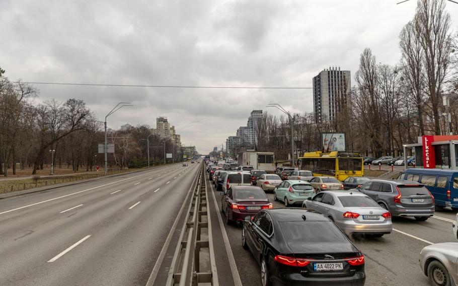 Residents seeking to leave the capital are stuck in traffic on a highway in Kyiv, Ukraine, on Feb. 24, 2022. 