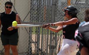 Kadena's McKenzie Johnson tags one against Kubasaki.