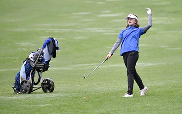 Victoria Bonavita of Rota finishes her swing at the No. 6 hole during the DODEA European championships at Rheinblick Golf Course in Wiesbaden, Germany.