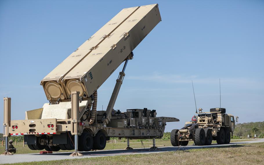 A U.S. soldier lifts the hydraulic launching system on a long-range hypersonic weapon during testing at Cape Canaveral Space Force Station, Fla., March 3, 2023.