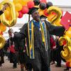 Army Sgt. Christian Awuku celebates after graduating with a bachelor’s degree from the University of Maryland Global Campus, Saturday, April 29, 2023.