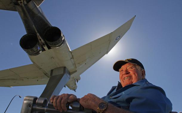 Retired USAF Col. Joe Kittinger, test pilot, space pioneer and war veteran underneath a F-4 Phantom II fighter Thursday, February 25, 206 at a park in east orlando dedicated to him. A PBS documentary "Space Men" celebrates the achievements of Central Florida's Joe Kittinger. Kittinger volunteered for project 'Excelsior', part of U.S. Air Force research in high-altitude bailouts including a 102,800-foot jump from a open gondola in1960.   (Red Huber/Staff Photographer)