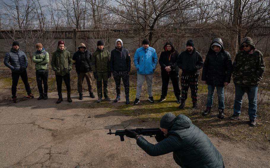 Ukrainians attend weapons training in Odesa on March 8. 