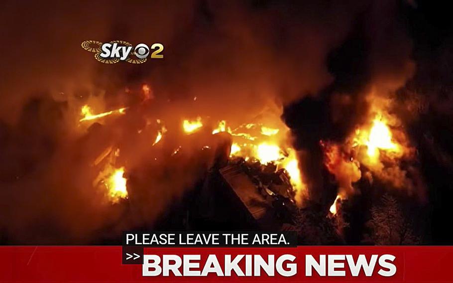 A video screen grab shows the fiery scene in East Palestine, Ohio, where a 50-car train derailment occurred Friday, Feb. 3, 2023.