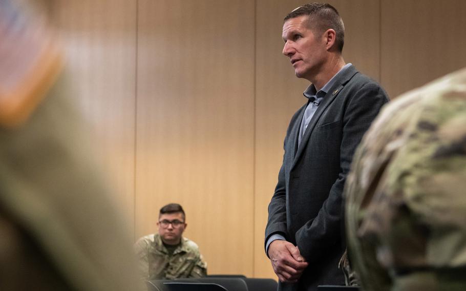 Retired Sgt. Maj. of the Army Daniel Dailey speaks with soldiers and their families at Sembach Kaserne, Germany, June 22, 2023.