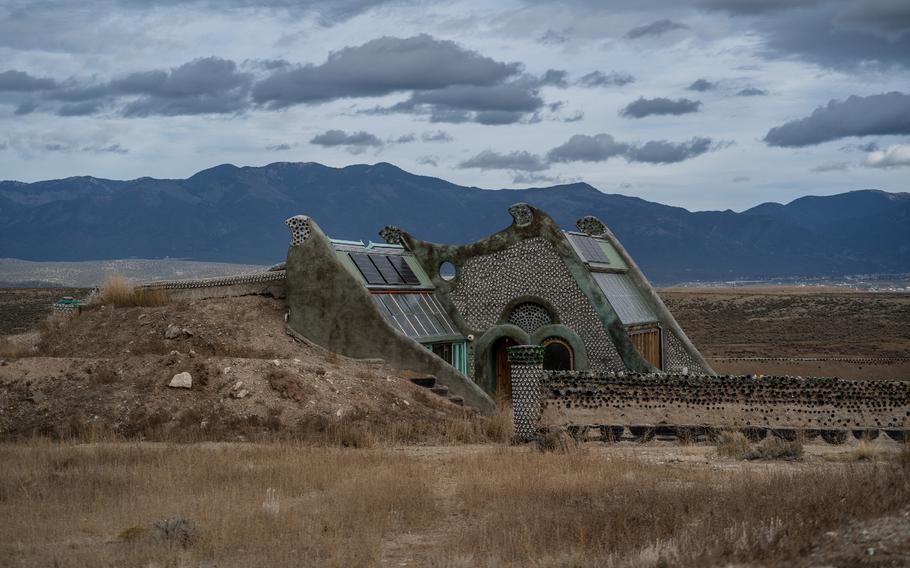 The exterior of an Earthship in Taos, N.M, on December 8, 2021. 