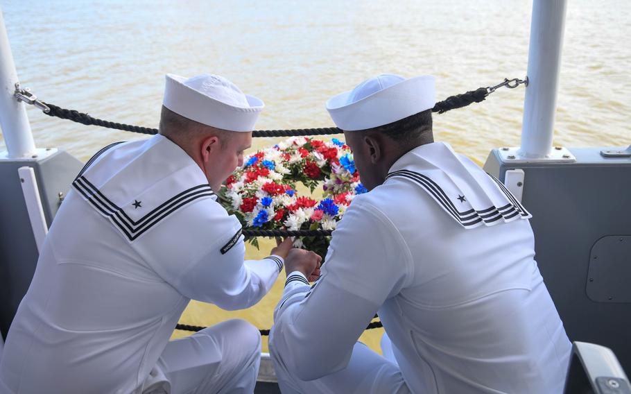 Sailors from Navy Munitions Command, other units and guests on Joint Base Pearl Harbor-Hickam, Hawaii, visited the site of the rusting hulk of LST-480 on Waipio Peninsula for a ceremony honoring the 80th Anniversary of the West Loch Disaster May 21, 2024. On May 21, 1944, while Army Ordnance troops loaded mortar ammunition on the fantail of LST-353, an explosion spread to other landing craft preparing for the invasion of Saipan. 