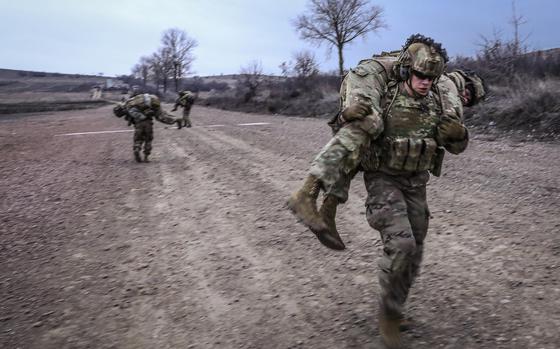 Soldiers from the 2nd Brigade Combat Team, 101st Airborne Division train at a site in Romania on January 26, 2023. The unit is being replaced in Europe by the division's 1st BCT. A 10th Mountain Division headquarters unit will also deploy to the Continent.