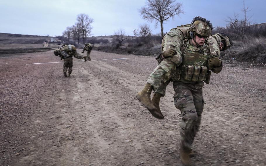 Soldiers from the 2nd Brigade Combat Team, 101st Airborne Division train at a site in Romania on Jan. 26, 2023. The unit is being replaced in Europe by the division’s 1st BCT. A 10th Mountain Division headquarters unit will also deploy to the Continent.