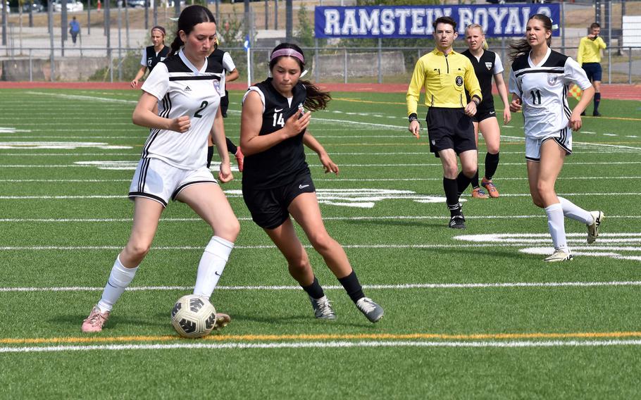 SHAPE’s Silvia Moreno and Stuttgart’s Sienna Ingle go head-to-head during the DODEA-Europe Division I girls soccer semifinals on Wednesday at Ramstein Air Base, Germany. Ingle, a sophomore forward, led the Panthers scoring with four goals in a 7-0 win.
