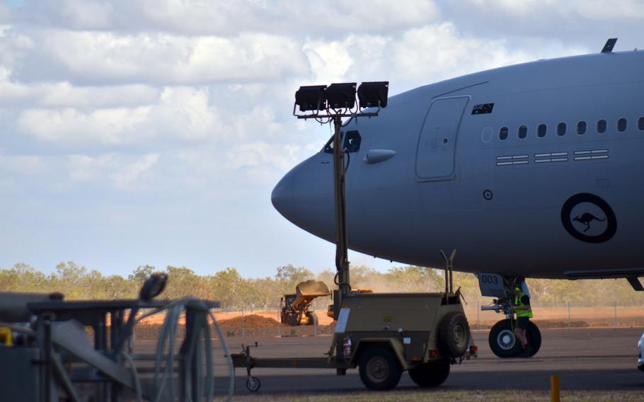 A Royal Australian Air Force plane passes a worksite on RAAF Tindal, Australia, Sept. 1, 2022. The space is being expanded to accommodate aircraft as large as U.S. Air Force B-52 bombers.