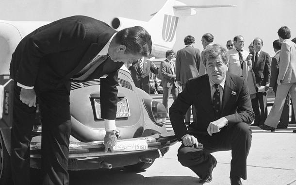 Republican presidential candidate Ronald Reagan, left, admires the bumper sticker on the car of Congressman Pete McCloskey as the congressman looks on, right, in San Jose, Calif., Sept. 25, 1980. Reagan was in the area on a campaign trip prior to leaving for more campaigning in Washington and Oregon. Former California Congressman McCloskey, who ran as a Republican challenging President Richard Nixon in 1972, has died Wednesday, May 8, 2024, at age 96.